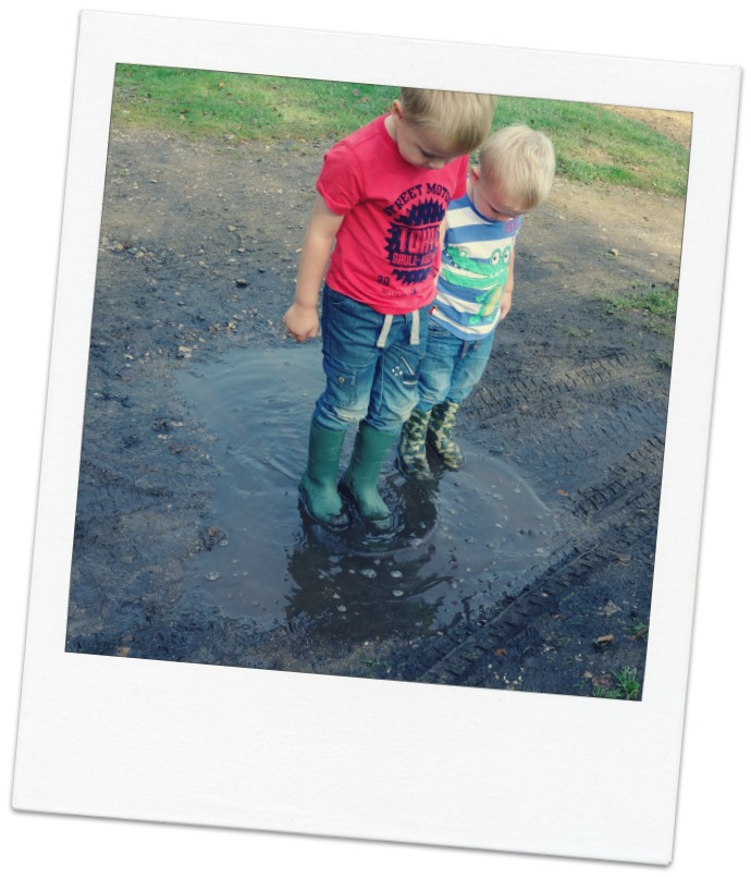 Boys in a puddle